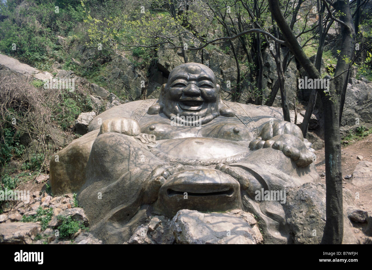 Zijinshan Tuotuo park Stone sculpture of Laughing Buddha Large fat figure ARCHIVED WITHDRAWN NANJING JIANGSU CHINA Stock Photo