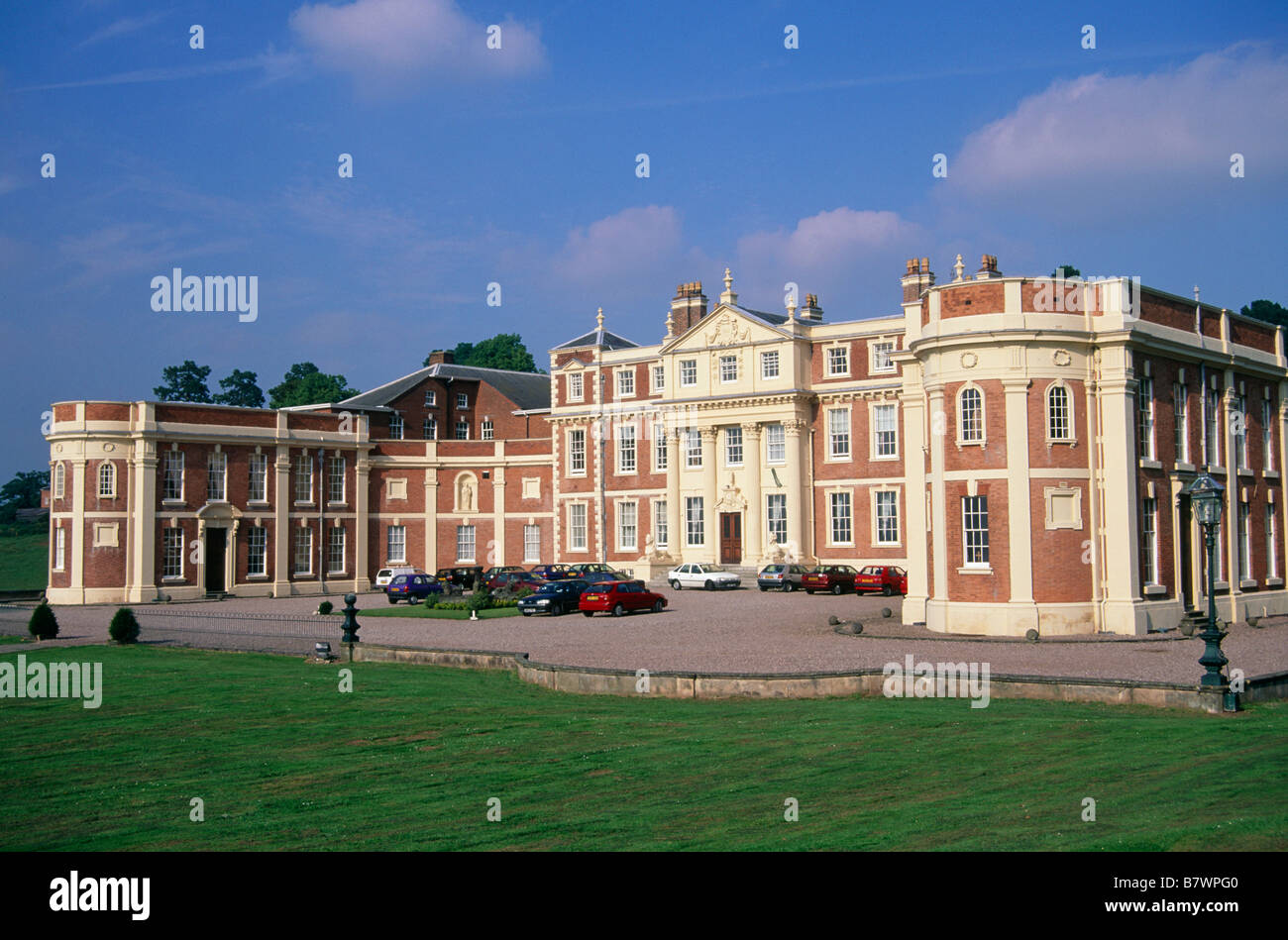 Hawkstone Hall Large house Facade Entrance Wings Cars parked on