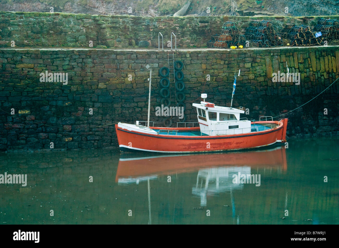 Fishing Trawler Moored in Crail Harbour in Fife Scotland Stock Photo