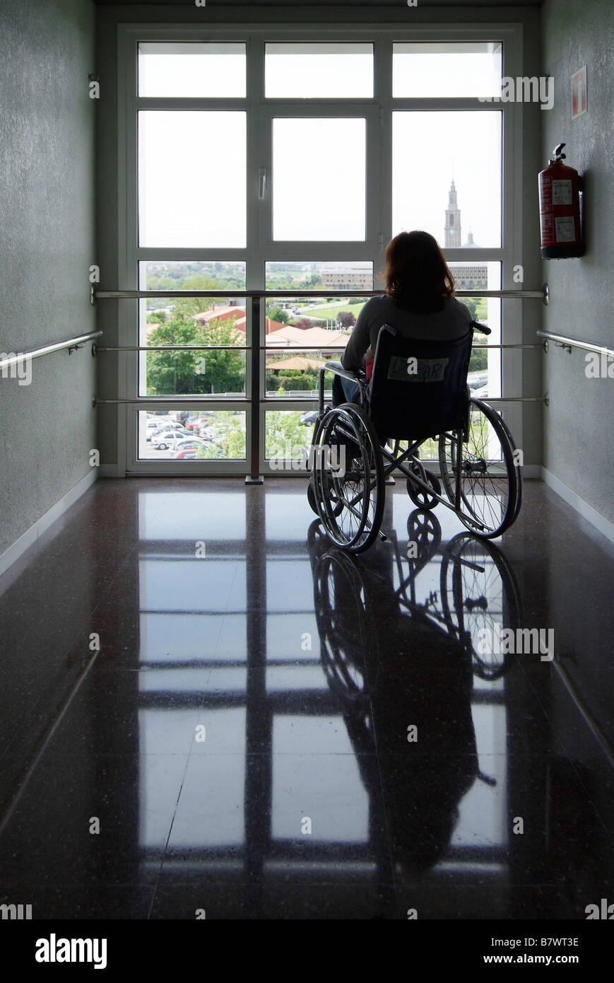 Woman on wheelchair at Cabueñes Hospital, Gijon, Asturias, Spain Stock Photo