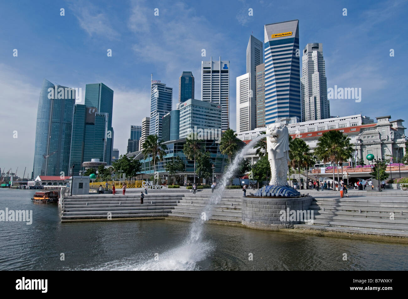 Merlionpark Marina bay half sea lion statue water fountain background Raffles Place CBD financial bank commercial centre Stock Photo
