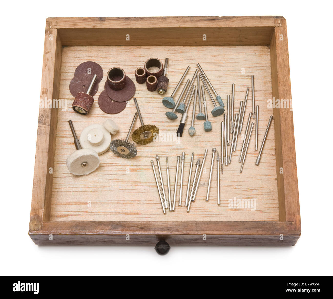 Small power tool tips in wooden drawer used for grinding and polishing shaping Stock Photo