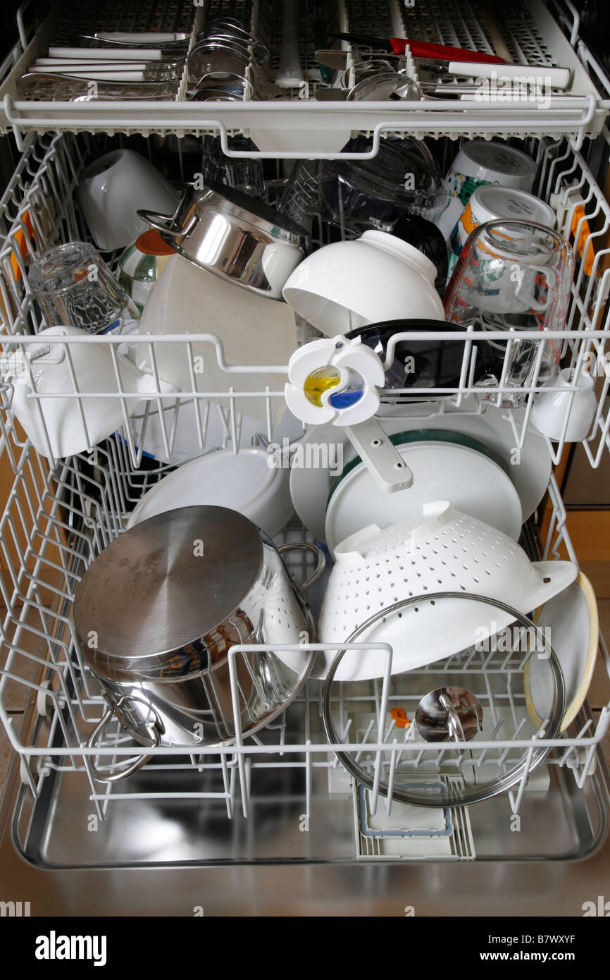 dishwasher with clean dishes inside Stock Photo