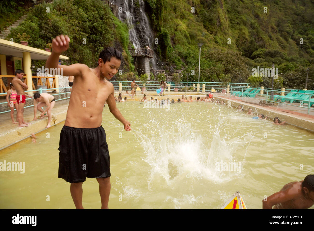 Boys splashing about in the thermal baths. Banos, Ecuador Stock Photo