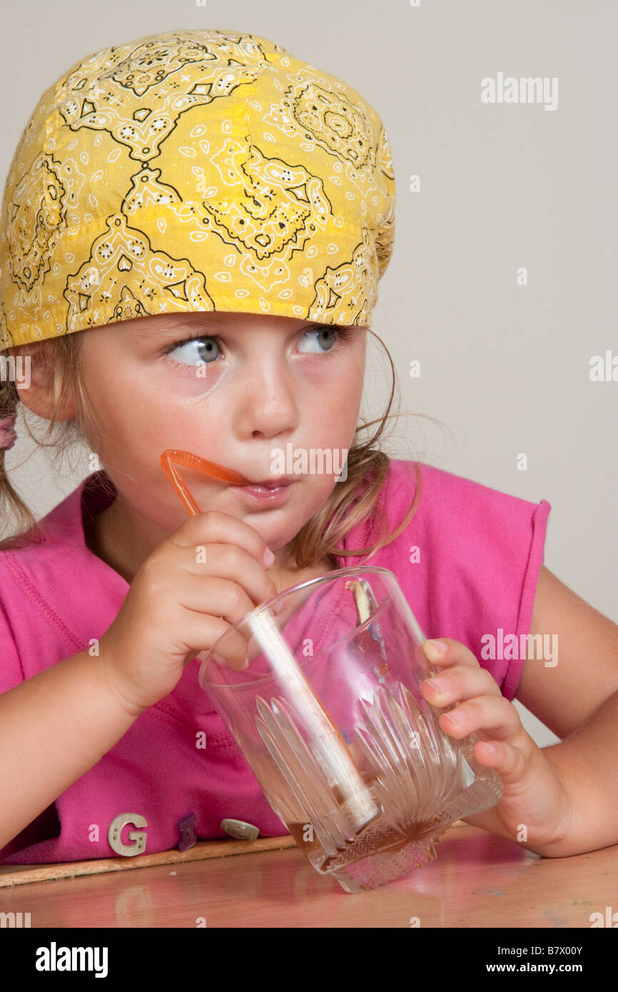 young girl drink her cocktail Stock Photo