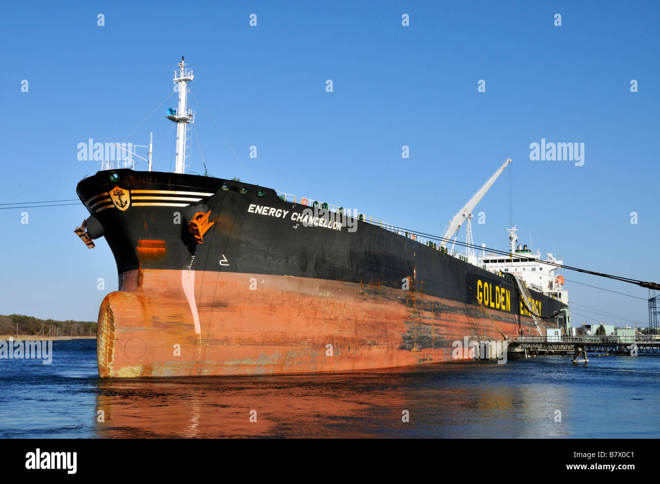 Fuel tanker Energy Chancellor tied off to pier from a low angle at the bow Stock Photo