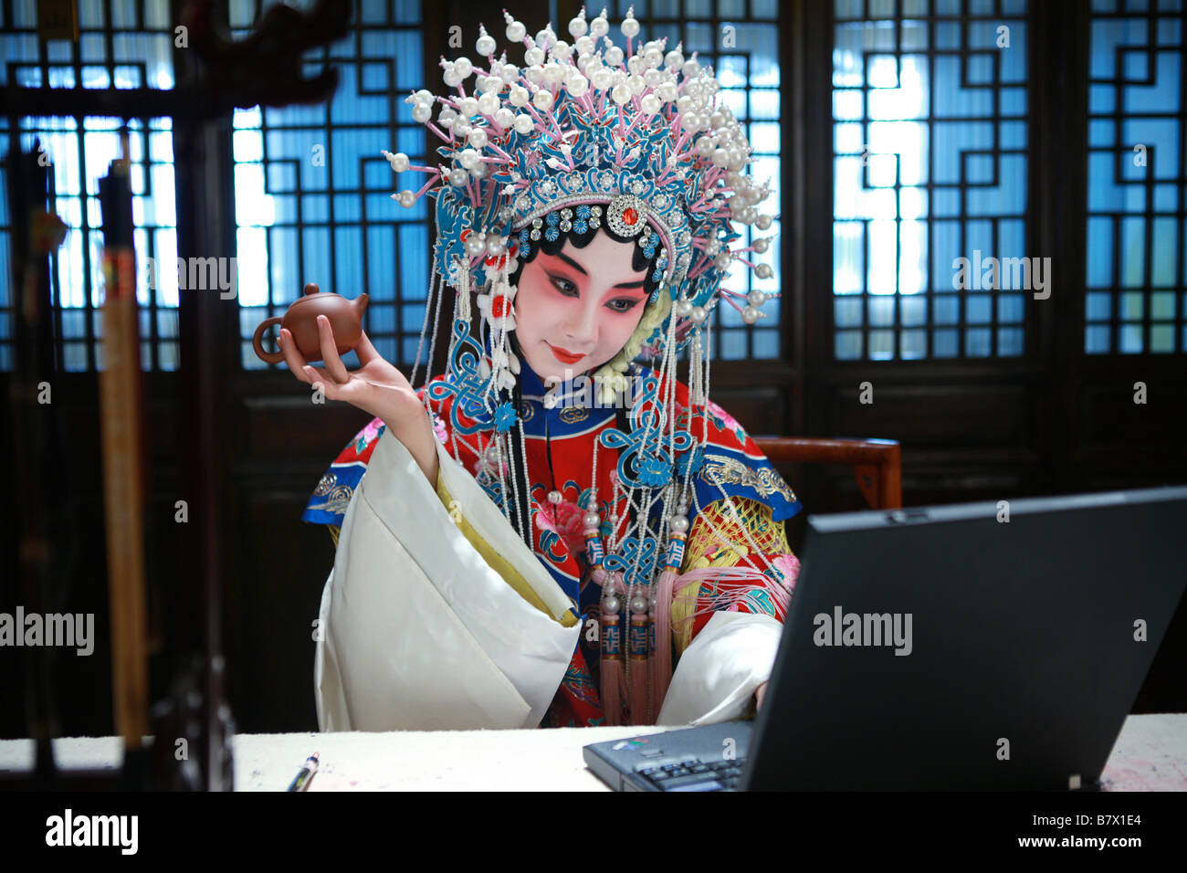 Actress Using Computer Beijing Opera Actress Using Notebook Pc,China Stock Photo - Alamy