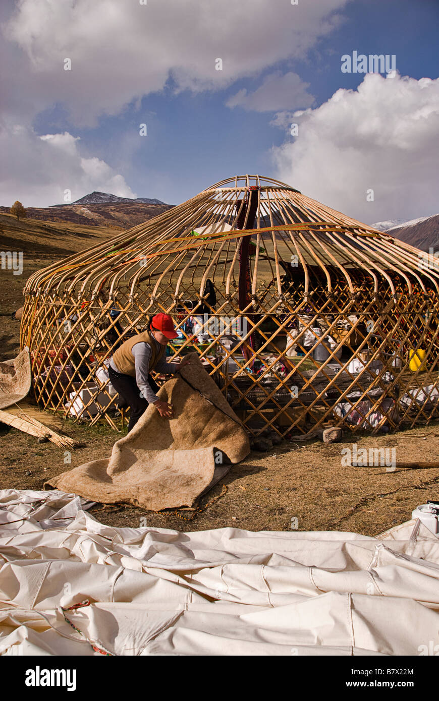 Nomad family getting ready to move camp for winter Altai Tavan Bogd Natonal Park Mongolia Stock Photo