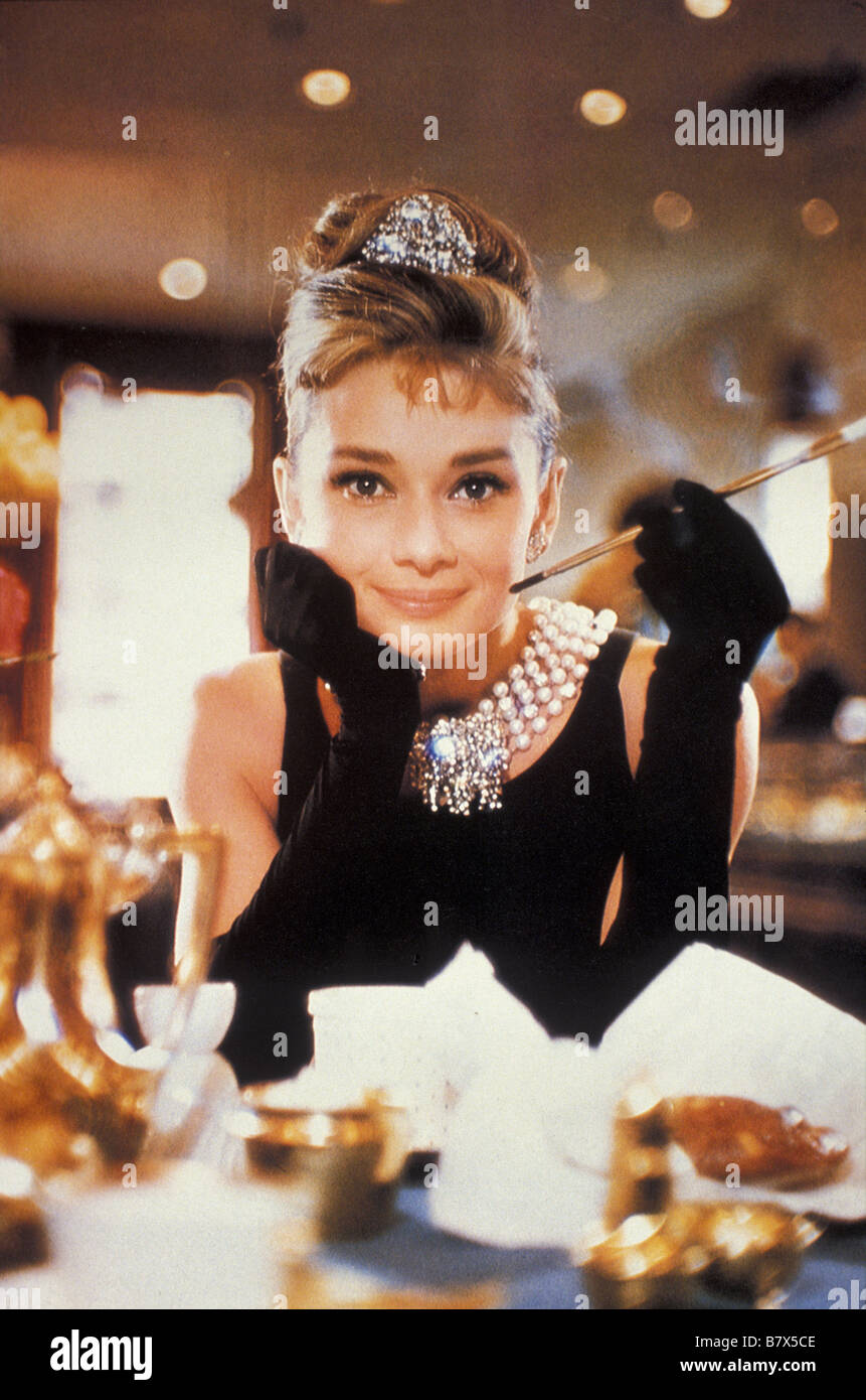 Audrey hepburn cigarette holder hi-res stock photography and images