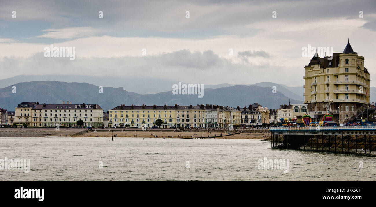 Panoramic view of the Grand Hotel and seafront houses of South Parade with North Shore beach and Ormes Bay, Llandudno in the foreground. Stock Photo