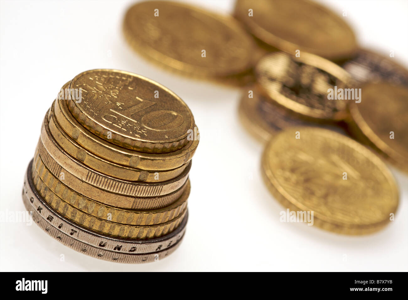 a selection of euro coins on a white background Stock Photo - Alamy