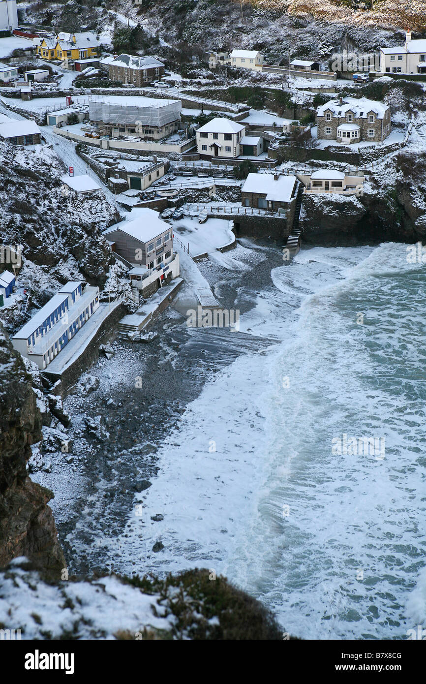 Snow covered Trevaunance Cove, St Agnes, Cornwall, UK Stock Photo