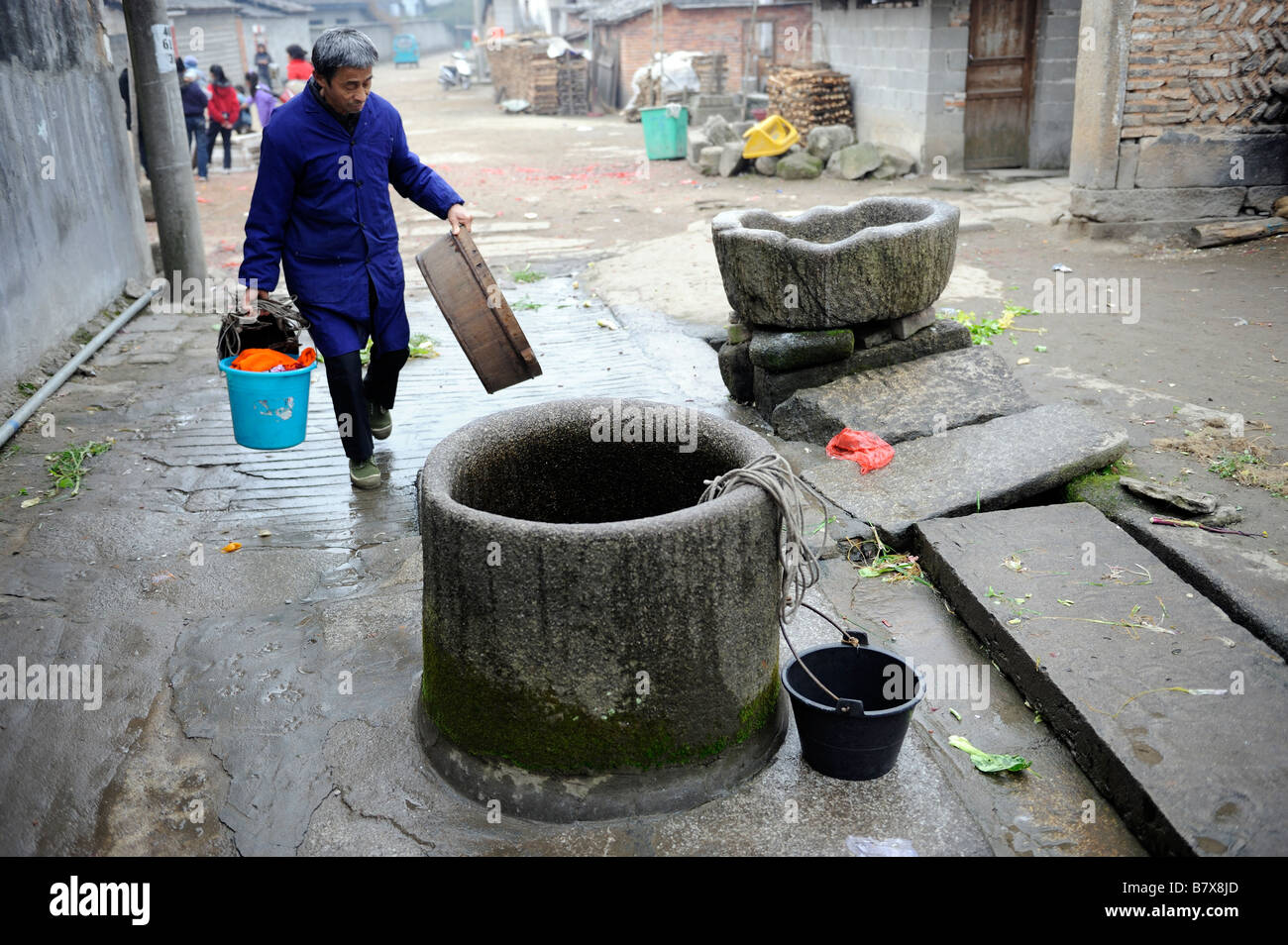 Ancient water well is still used in Tianbao village, Yifeng, Jiangxi, China. 02-Feb-2009 Stock Photo