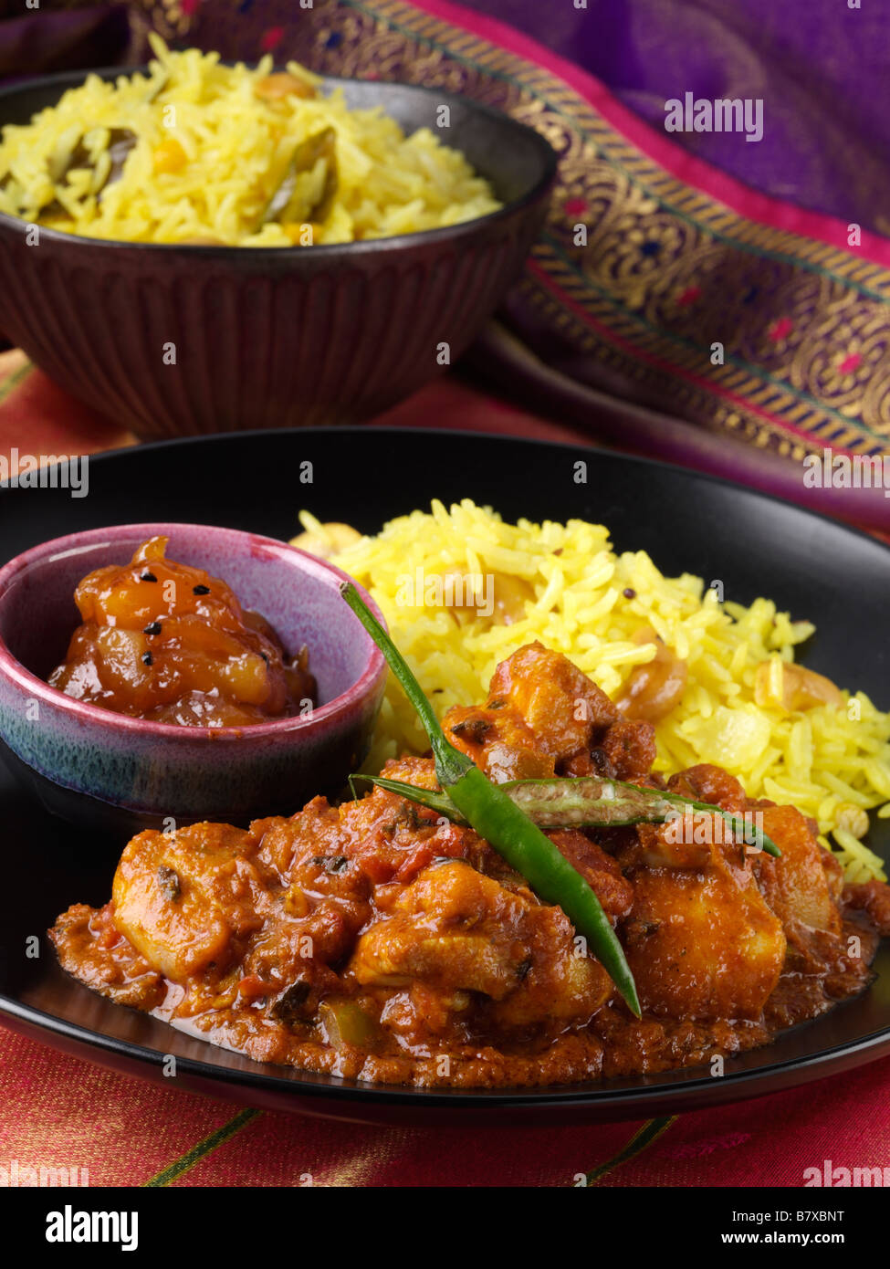 Spicy kashmiri chicken curry saffron rice hires stock photography and