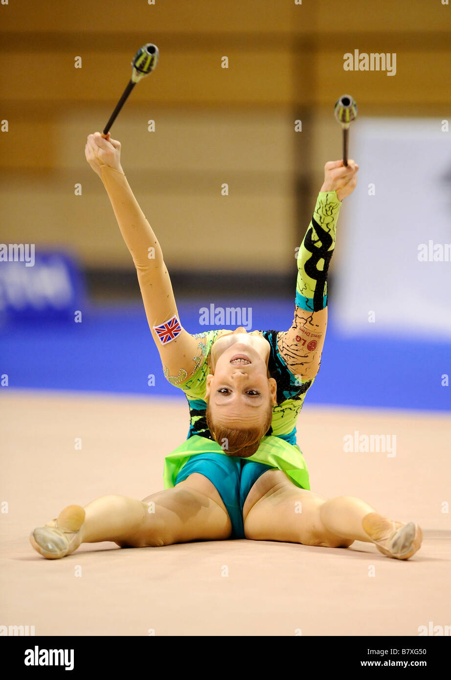woman doing rhythmic gymnastics with clubs Stock Photo Alamy
