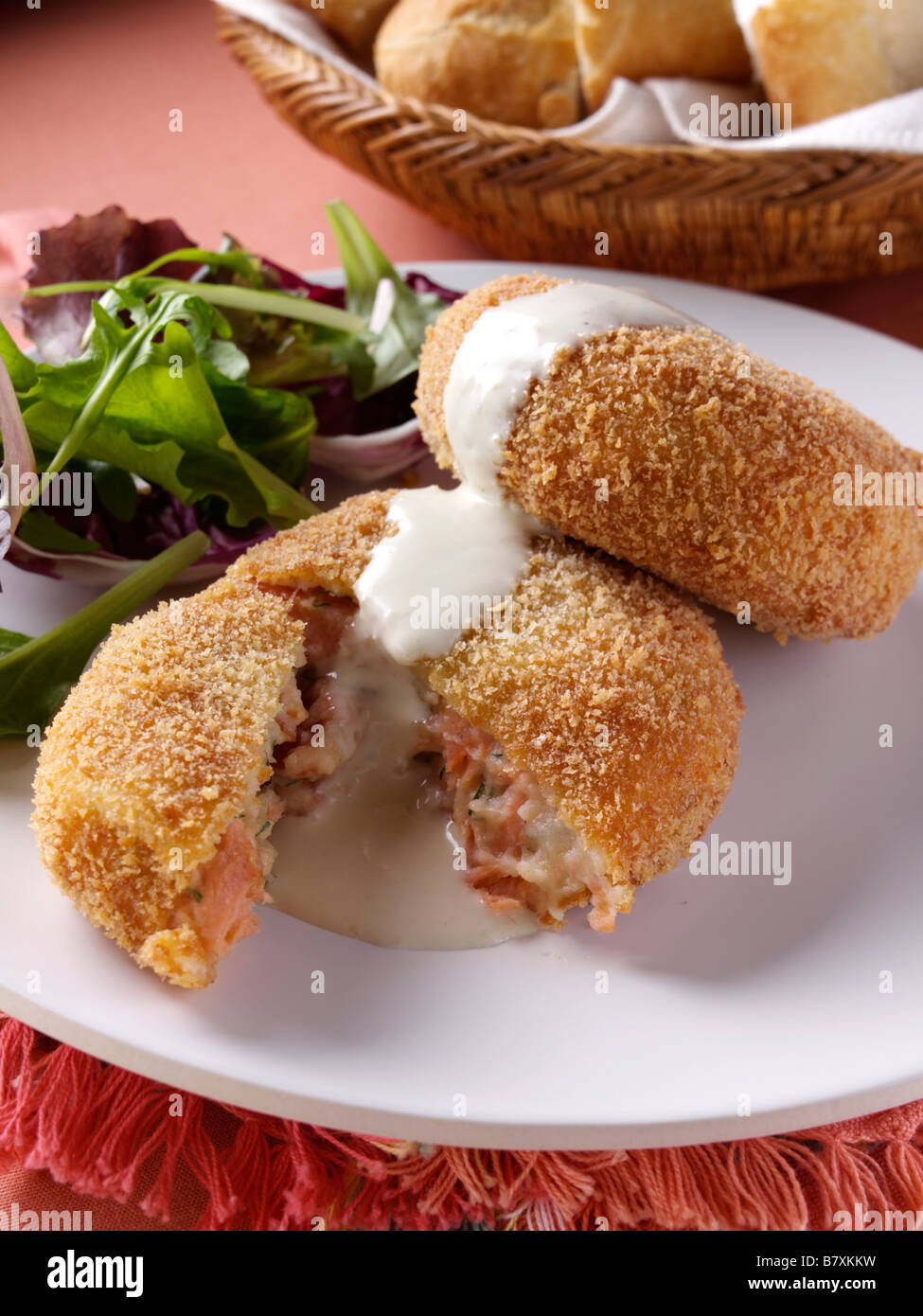 Smoked salmon fishcakes with hollandaise sauce Stock Photo - Alamy