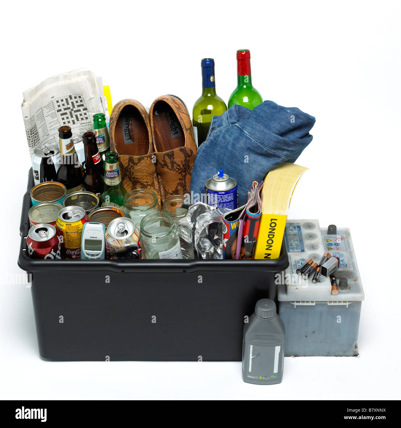 Recycling waste in a black bin Stock Photo Alamy