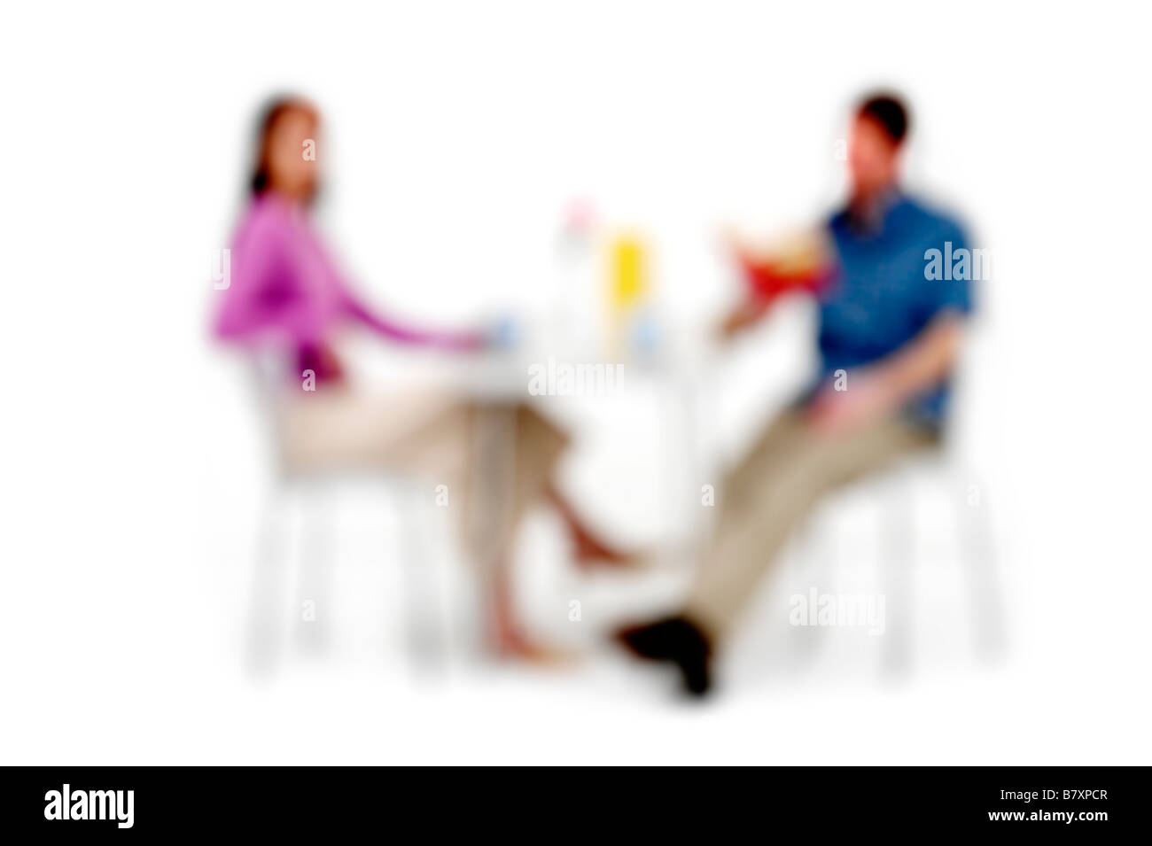 Blurred out of focus people on a white background Stock Photo