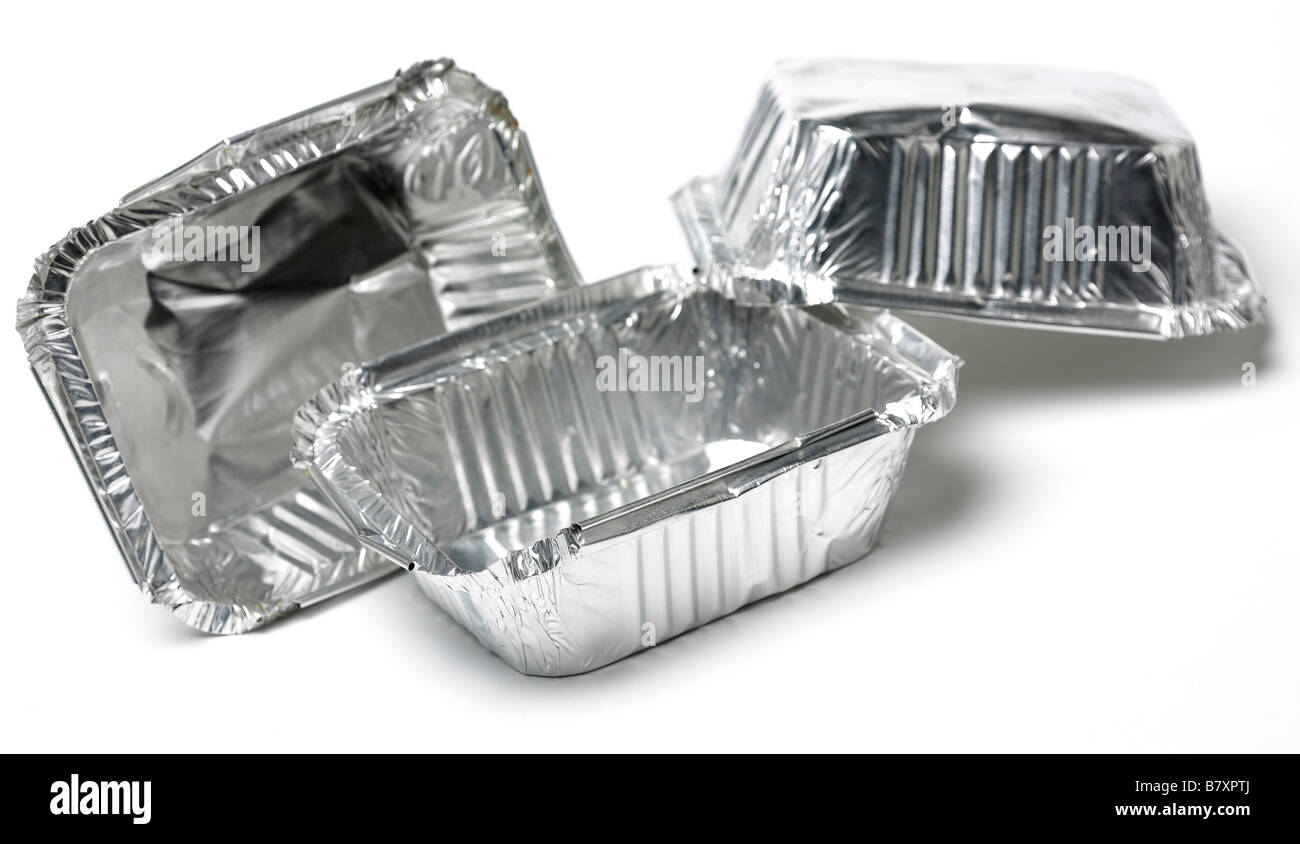 Empty aluminium trays that are commonly used for ready meals and take-aways Stock Photo