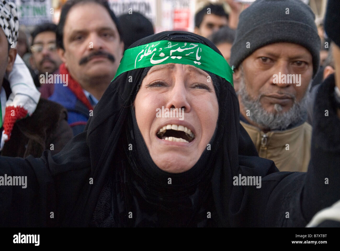 PALESTINIAN WOMAN CRYING ,DURING THE DEMO AGAINST ISRAEL'S OCCUPATION IN GAZA Stock Photo