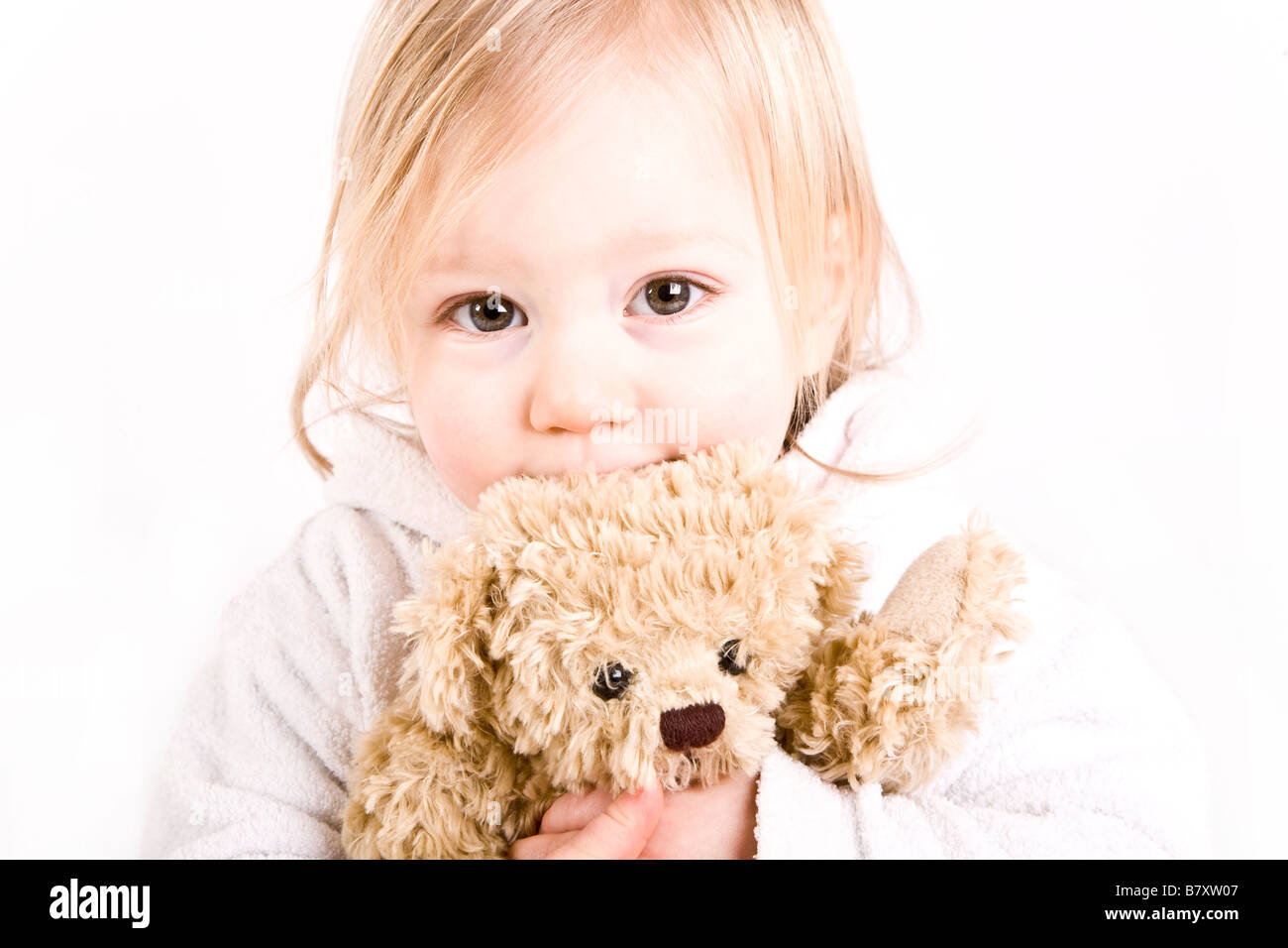 Baby cuddling bear hi-res stock photography and images - Alamy