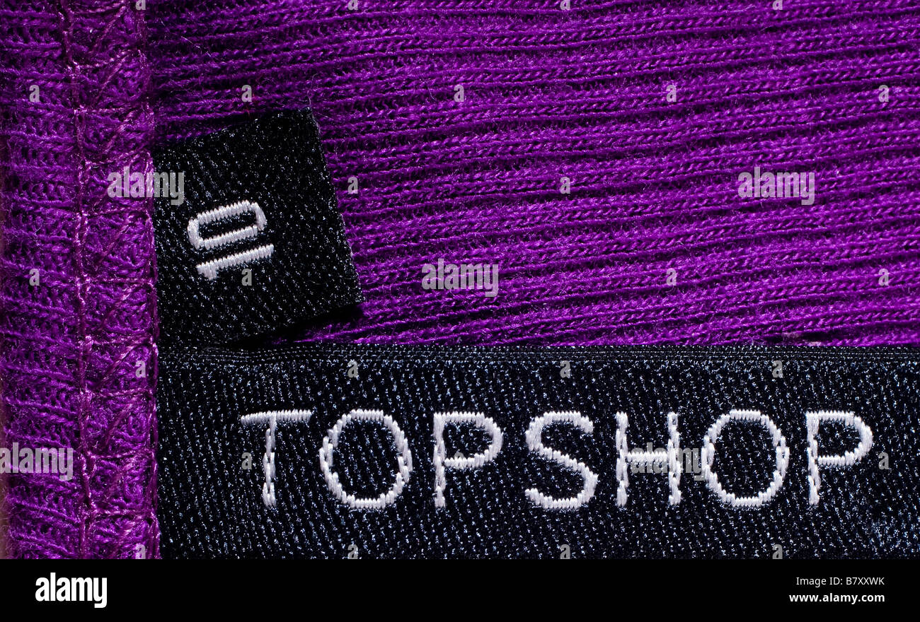 A purple Topshop garment showing the topshop label Stock Photo - Alamy
