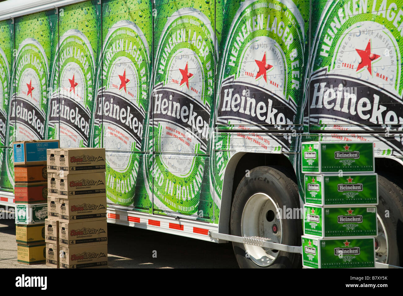 ILLINOIS DeKalb Cases of Heineken Coors and other beer brands stacked next to Heineken delivery truck Stock Photo