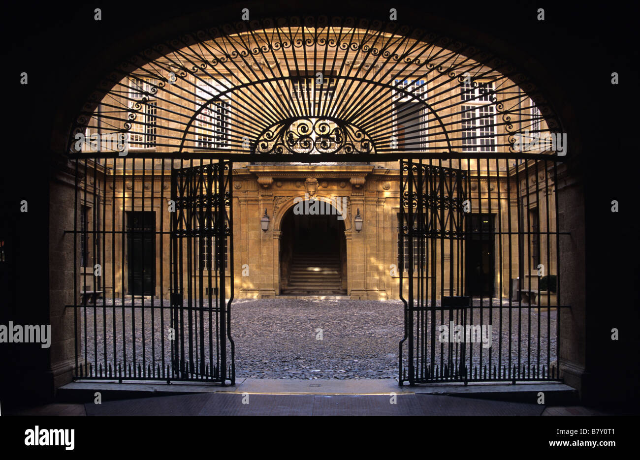 Wrought Iron Entrance and Courtyard of Aix-en-Provence Town Hall (Mairie) (1655-70), Aix en Provence, France Stock Photo