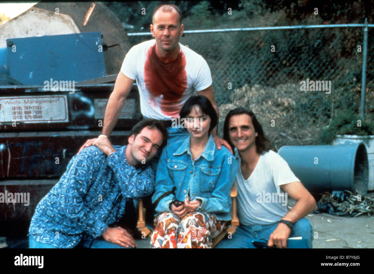 Pulp Fiction  Year: 1994 USA Director: Quentin Tarantino Quentin Tarantino, Bruce Willis, Maria de Medeiros  Shooting picture  Golden Palm Cannes 1994 Stock Photo