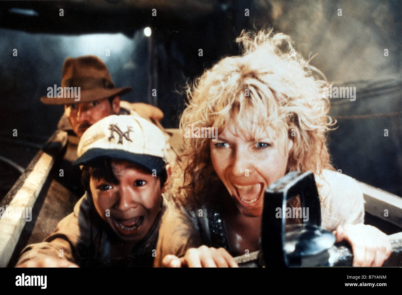 Indiana Jones and the Temple of Doom  Year: 1984 Harrison Ford, Kate Capshaw , Jonathan Ke Quan  Director: Steven Spielberg Stock Photo