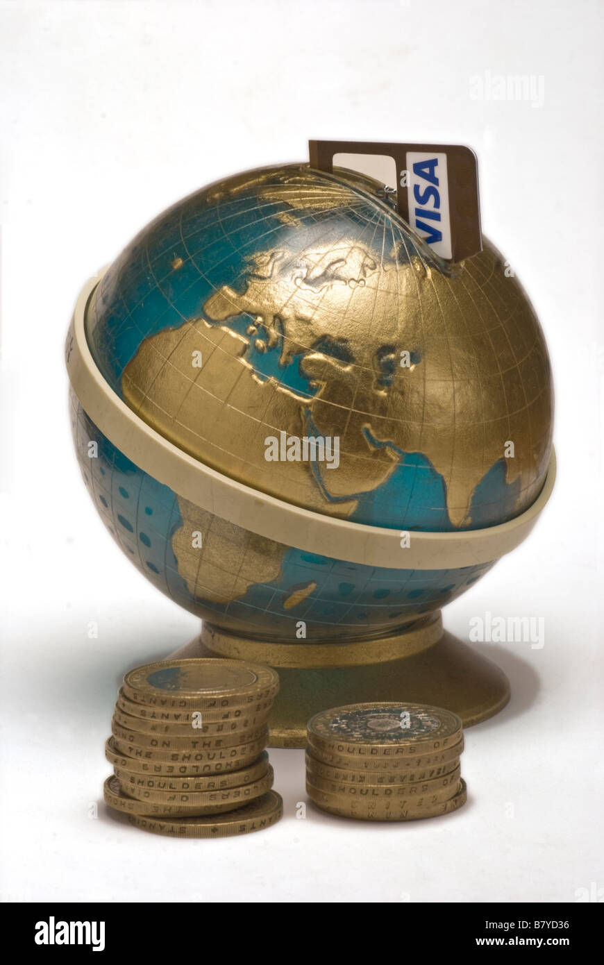 A money box in the shape of a globe Stock Photo