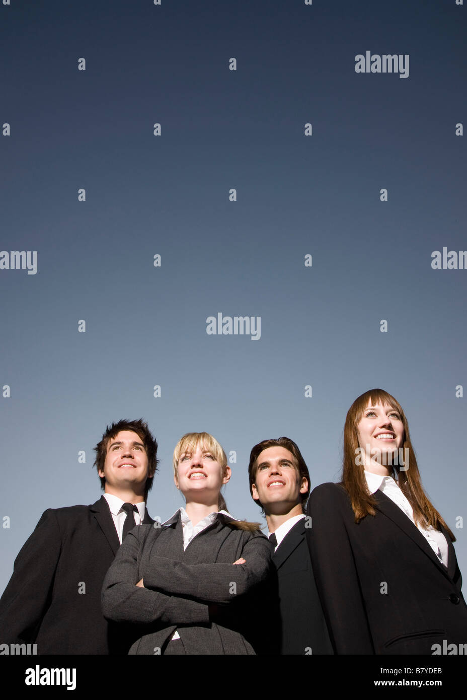 Posed group people suits hi-res stock photography and images - Alamy