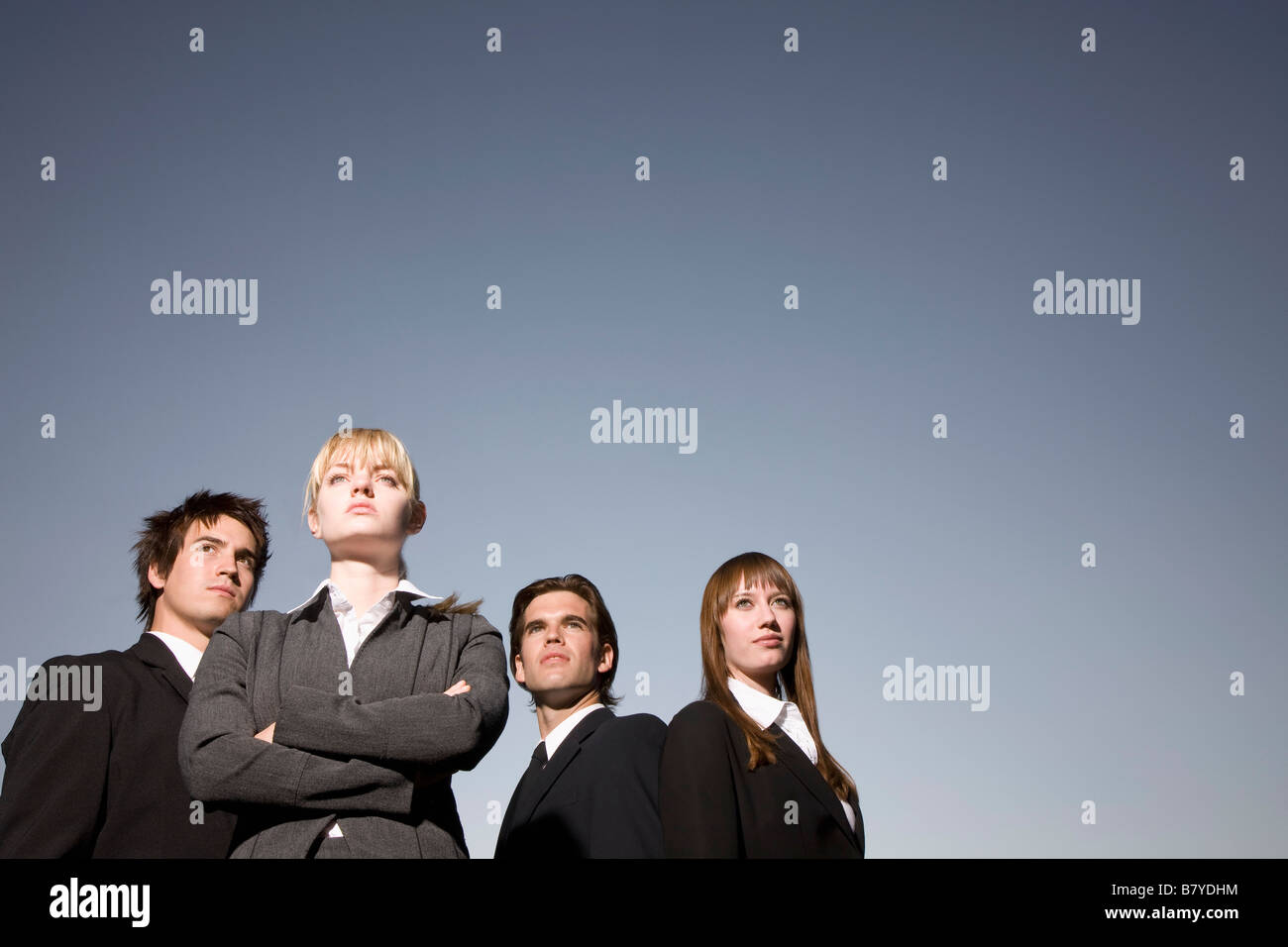Posed group people suits hi-res stock photography and images - Alamy