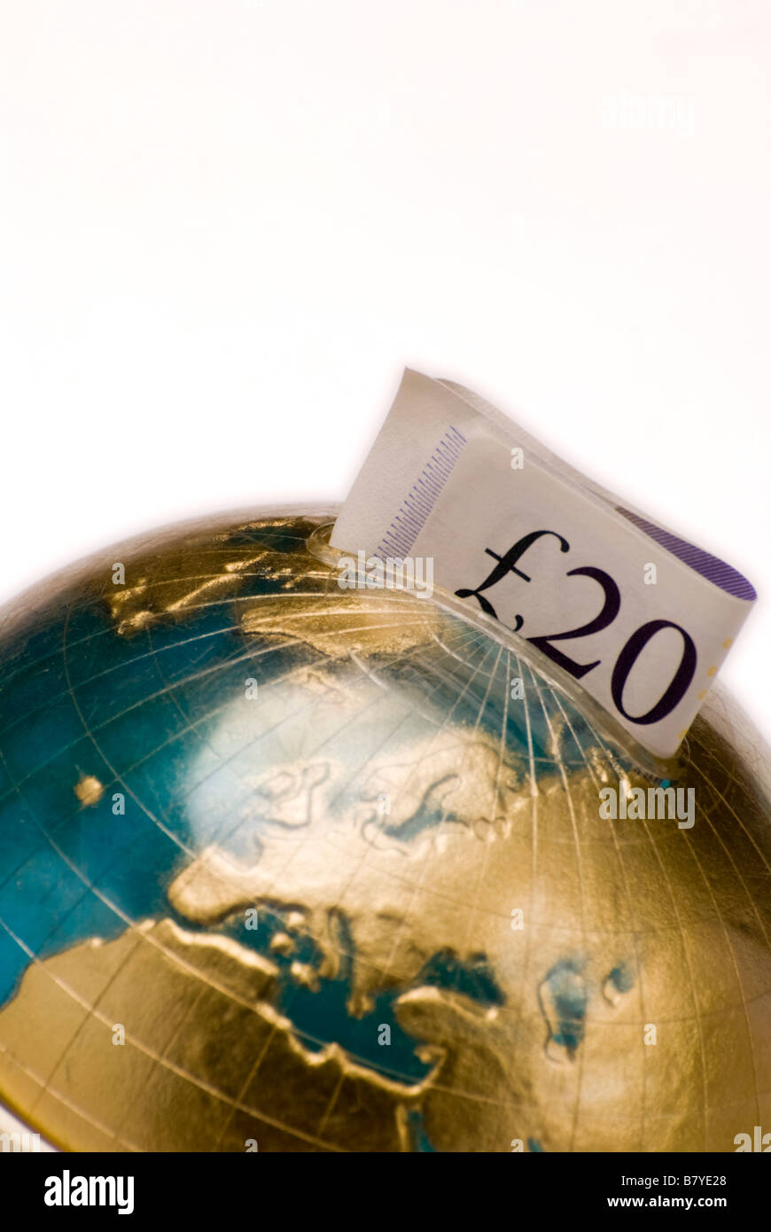 A money box in the shape of a globe Stock Photo
