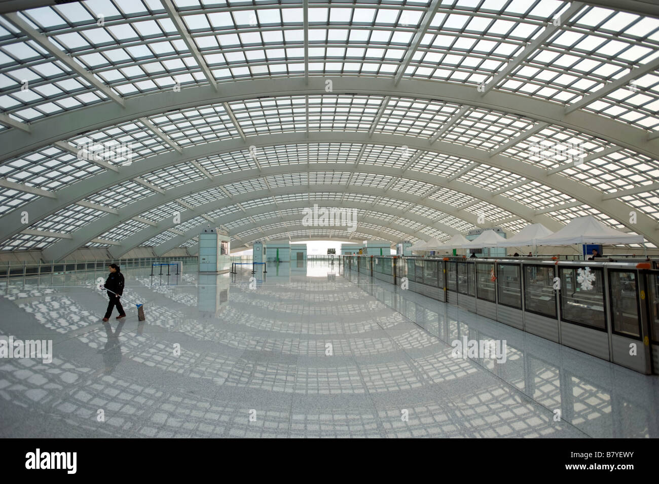 Interior of large modern new Airport Express railway station at Beijing Airport Terminal 3 China 2009 Stock Photo