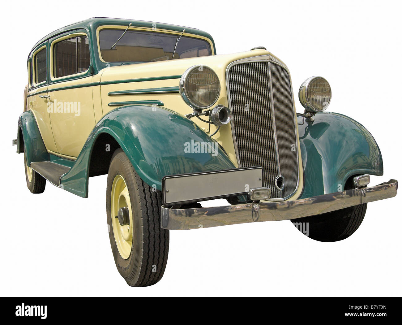 The antiquarian car isolated over white with clipping path Stock Photo