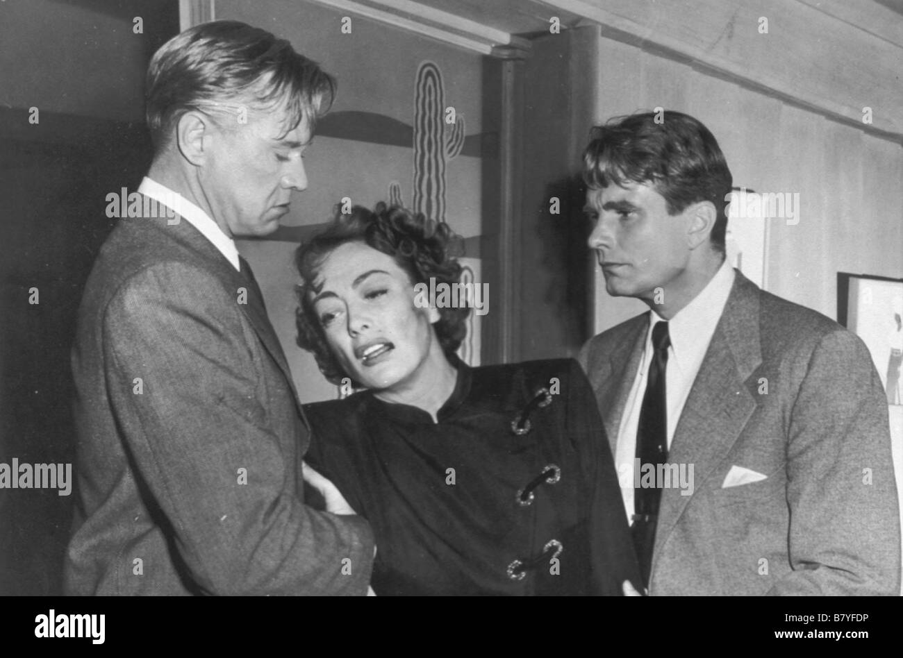 l'esclave du gang The Damned Don't Cry  Year: 1950 USA Joan Crawford , David Brian , Steve Cochran  Director: Vincent Sherman Stock Photo