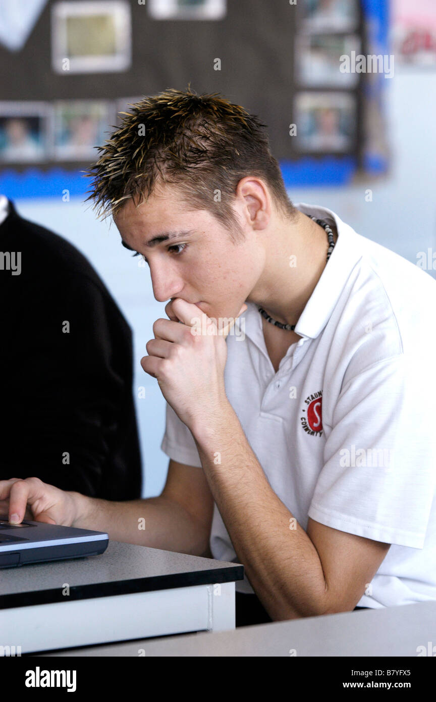 male pupil in secondary school classroom Stock Photo - Alamy