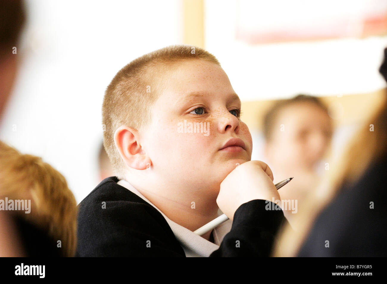 male pupil in secondary school classroom Stock Photo - Alamy