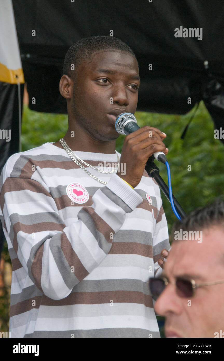 A Young Black Male Gospel Singer Performing His Song Against Knife   A Young Black Male Gospel Singer Performing His Song Against Knife B7YGWR 