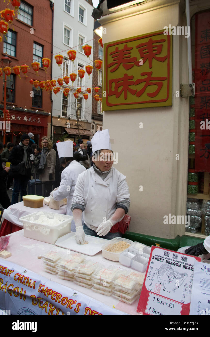 Female Chinese Chef Preparing Dragon Beard Candy On Street Stall Stock Photo Alamy Female Chinese Chef Preparing Dragon Beard Candy On Street Stall Stock Photo Alamy