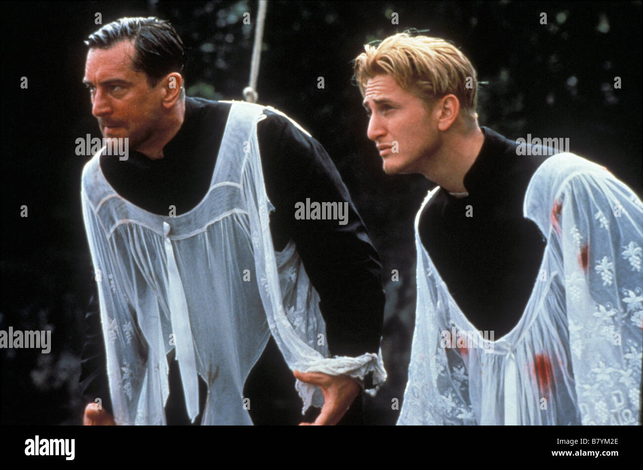 We're No Angels Year: 1989 USA Robert De Niro, Sean Penn Director: Neil  Jordan Stock Photo - Alamy