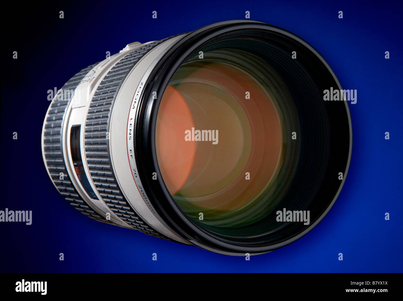 A white body lens with ruby red coatings on the front elements This one os an 80 200 zoom from an SLR digital camera Stock Photo