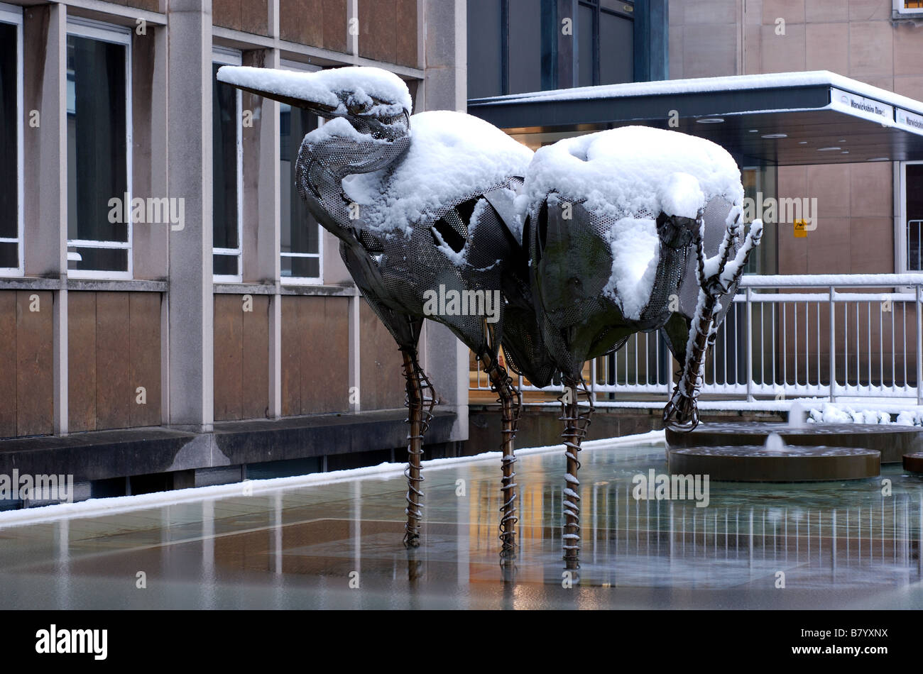Heron sculptures with snow on, Warwick, Warwickshire, England, UK Stock Photo