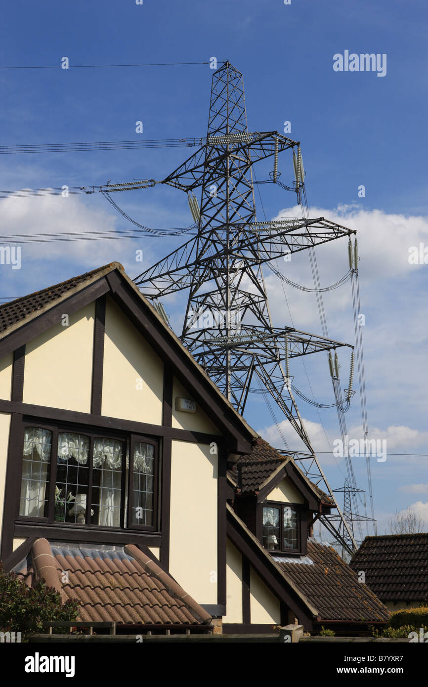 Power lines and a pylon over a house at Oxford Stock Photo Alamy