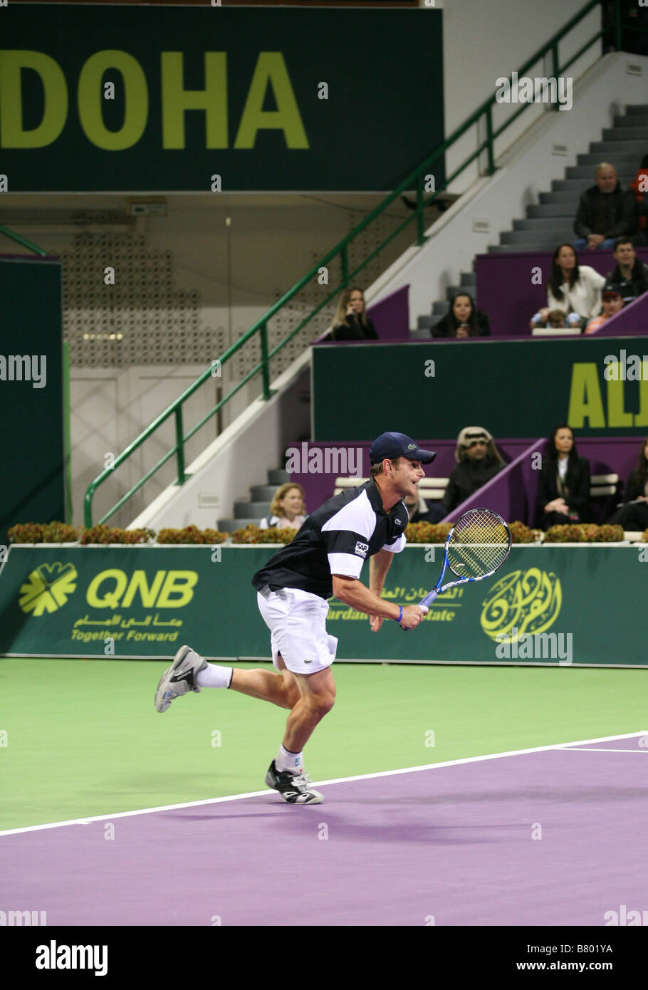 American Andy Roddick in the final of the Qatar ExxonMobil Open tournament 2009 which he lost to Briton Andy Murray Stock Photo
