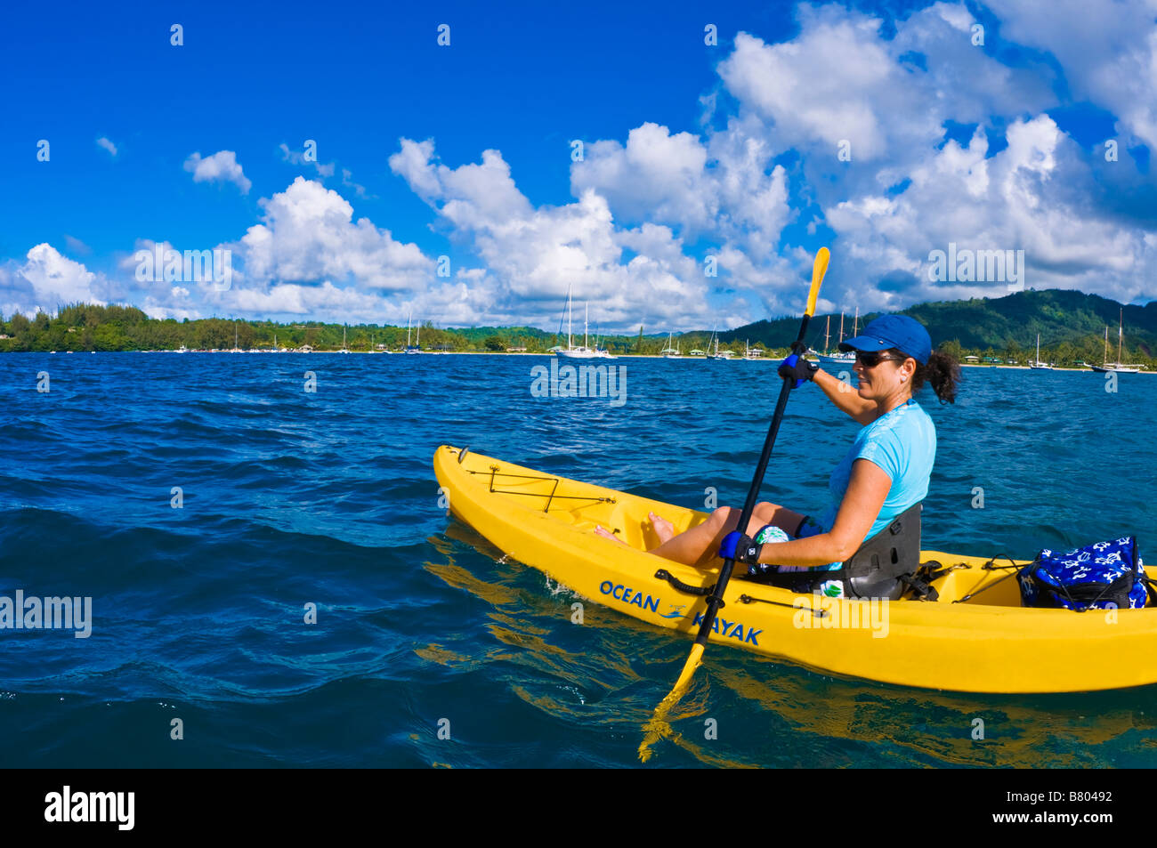 Woman kayaking on Hanalei Bay Island of Kauai Hawaii Stock Photo Alamy
