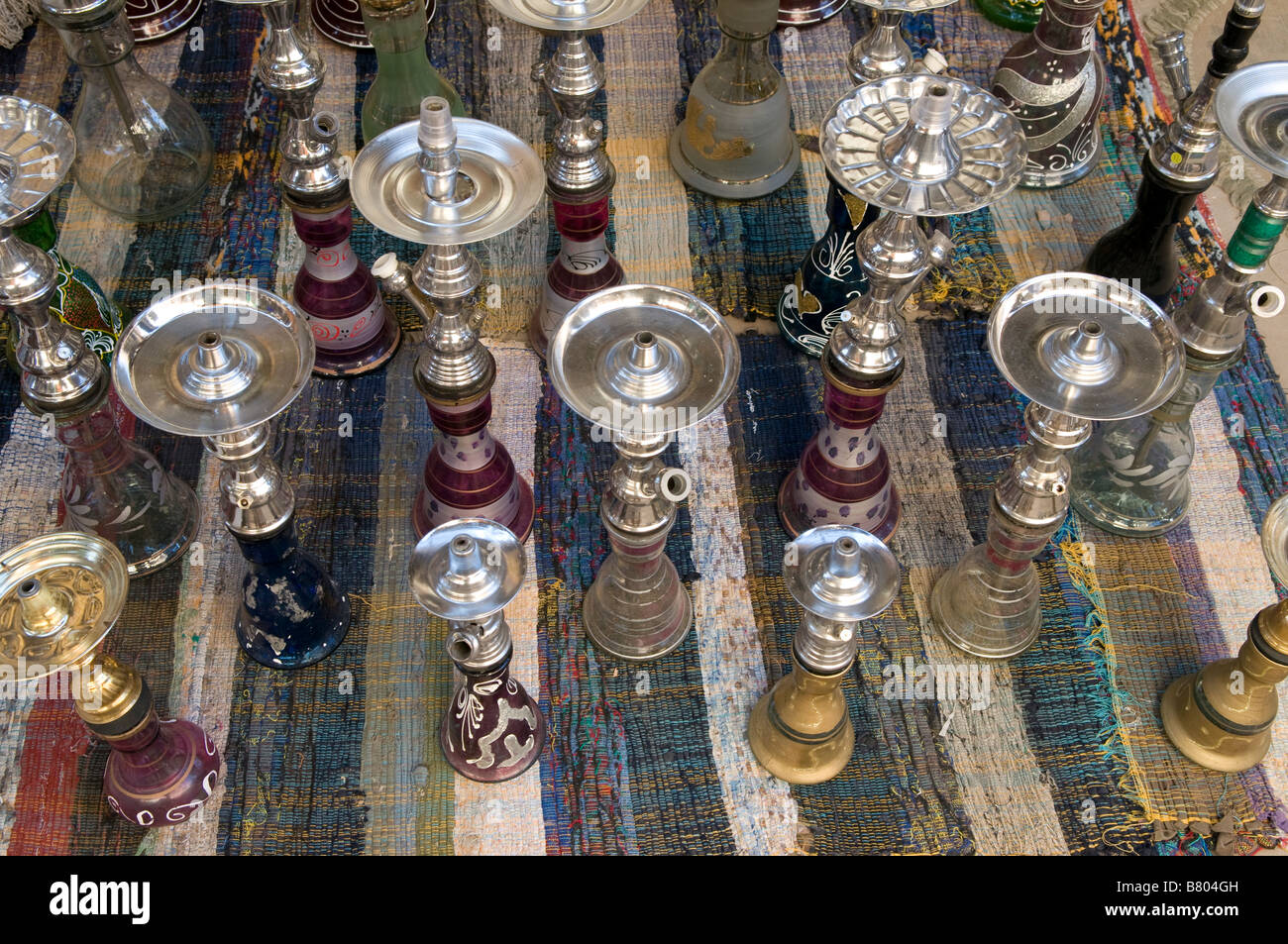 Stack of hookah pipes also known as a water pipe, Narghile,  nargeela, narghileh or nargile popular for smoking in the Arab Middle East Stock Photo