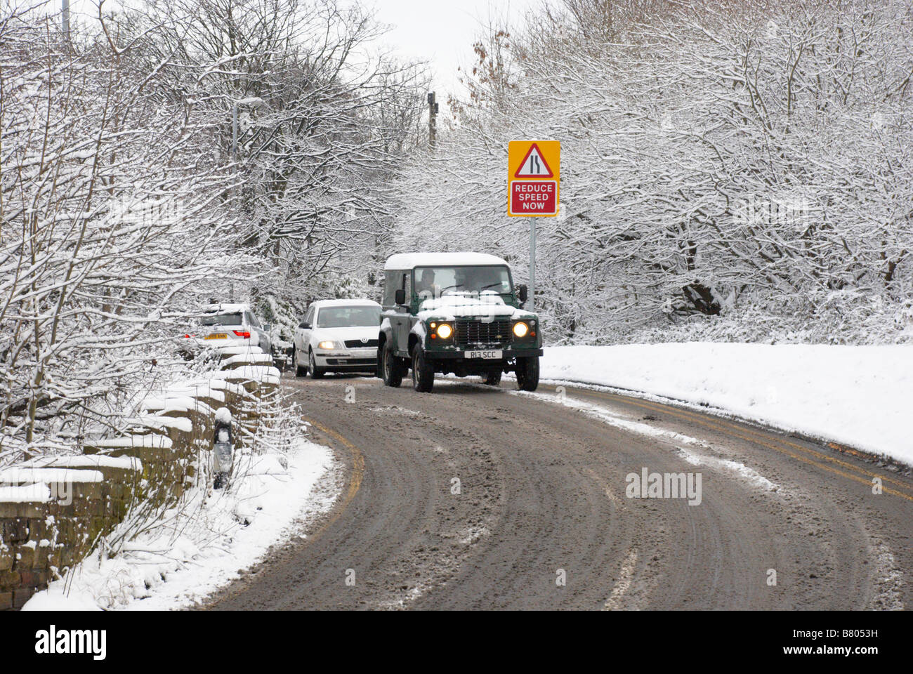 cars on a snowy winter road Stock Photo - Alamy