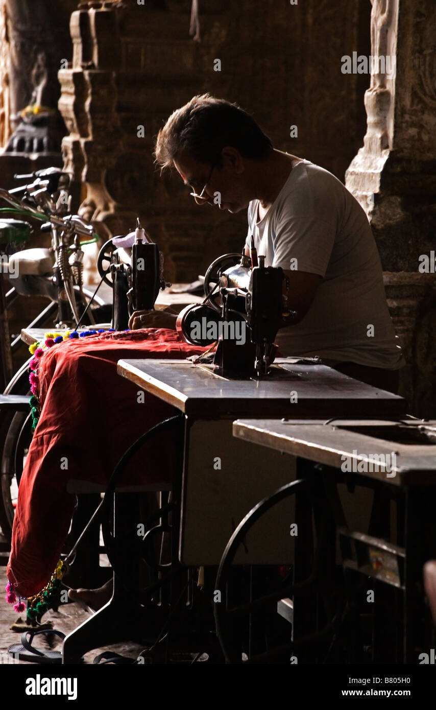 Tailor working near Shree Meenakshi Temple in Madurai India Stock Photo